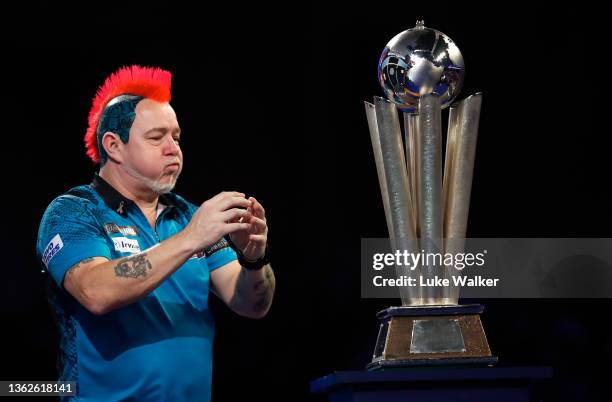 Peter Wright of Scotland celebrates the win during the Finals against Michael Smith of England during Day Sixteen of The William Hill World Darts...