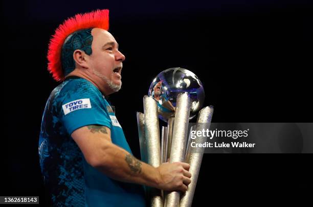 Peter Wright of Scotland celebrates the win during the Finals against Michael Smith of England during Day Sixteen of The William Hill World Darts...