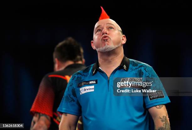 Peter Wright of Scotland celebrates the win during the Finals against Michael Smith of England during Day Sixteen of The William Hill World Darts...