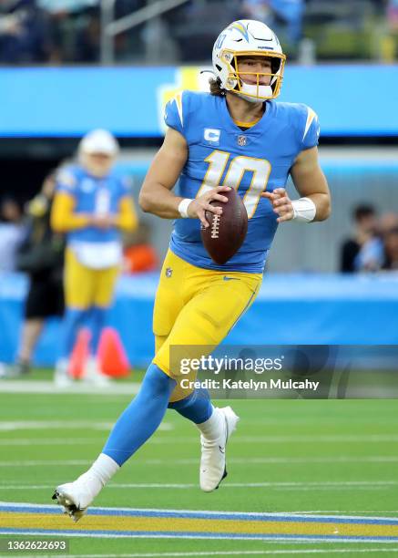 Justin Herbert of the Los Angeles Chargers looks to pass the ball during the third quarter against the Denver Broncos at SoFi Stadium on January 02,...