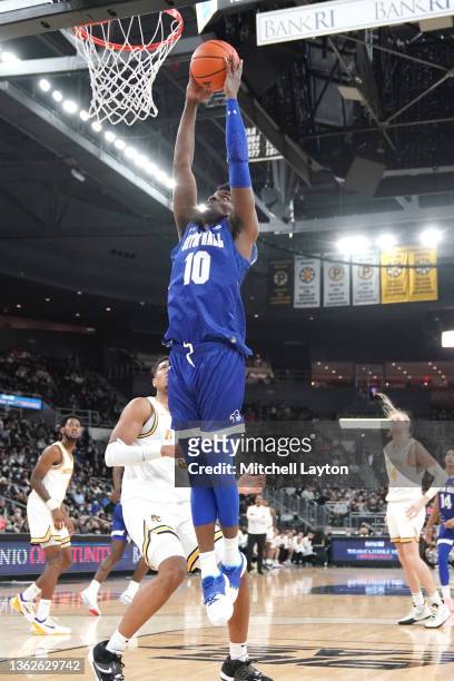 Alexis Yetna of the Seton Hall Pirates dunks the ball during a college basketball game against the Providence Friars at the Dunkin' Donuts Center on...
