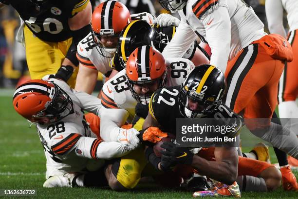 Najee Harris of the Pittsburgh Steelers carries the ball during the second quarter against the Cleveland Browns at Heinz Field on January 03, 2022 in...