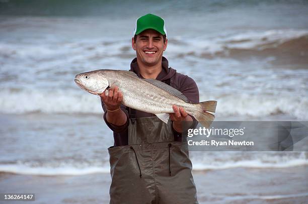 mulloway fisherman - catch of fish stock pictures, royalty-free photos & images