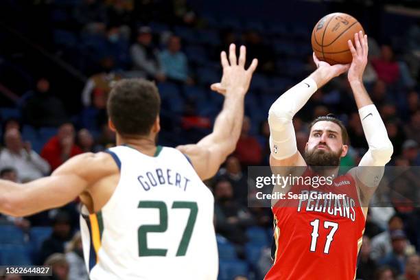 Jonas Valanciunas of the New Orleans Pelicans shoots over Rudy Gobert of the Utah Jazz during the fourth quarter at Smoothie King Center on January...