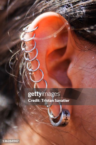 Style Of Ear Piercing Called Helix Piercing High-Res Stock Photo
