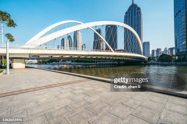 parking lot by the river - river bottom park stock pictures, royalty-free photos & images