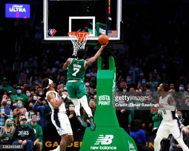 Jaylen Brown of the Boston Celtics lays up against Wendell Carter Jr. #34 of the Orlando Magic during the fourth quarter of the game at TD Garden on...