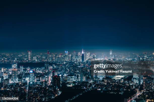 the tokyo skyline from above at night - tokyo city lights stock pictures, royalty-free photos & images