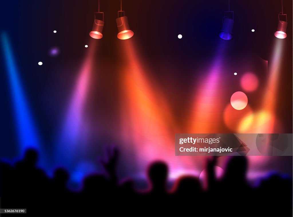 Concert hall with people silhouettes