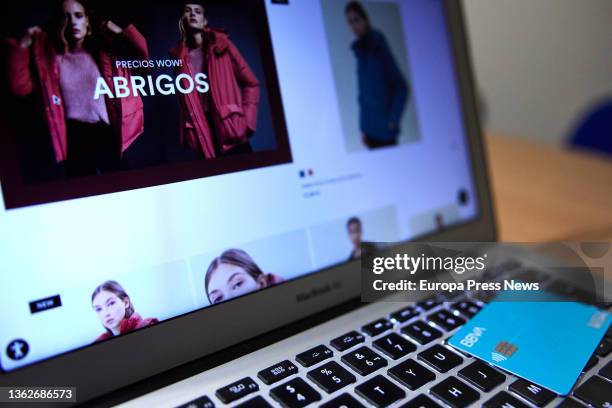 Person shops with his credit card during the week in which the online sales began, on January 4 in Madrid, Spain. The January and February sales...