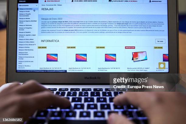 Person shops with his computer during the week in which the online sales have begun, on January 4 in Madrid, Spain. The January and February sales...