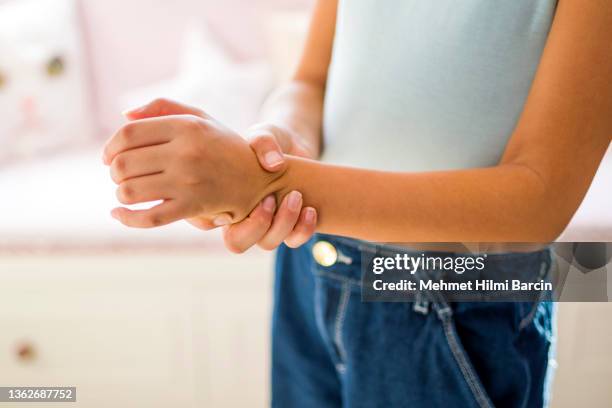 wrist pain - human joint stock pictures, royalty-free photos & images