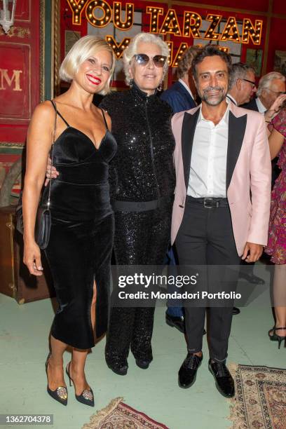 Italian designer Chiara Boni with Antonella Elia and Pietro delle Piane on the occasion of the party for 50 years of activity, organized during the...