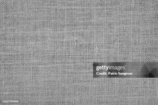 full frame close-up of burlap texture and textile background. - textile patch fotografías e imágenes de stock