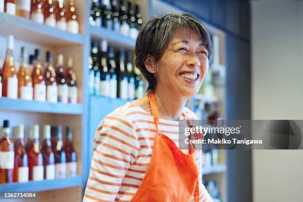 a portrait of members of a family-owned wine store - only japanese bildbanksfoton och bilder