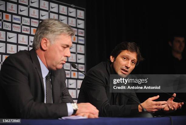 Carlo Ancelotti , coach of Paris Saint Germain FC, and Léonardo Nascimento de Araújo, sportive director, speak at a press conference at Parc des...