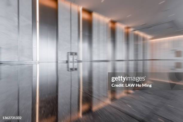 elevators in commercial office buildings - elevator doors stock-fotos und bilder