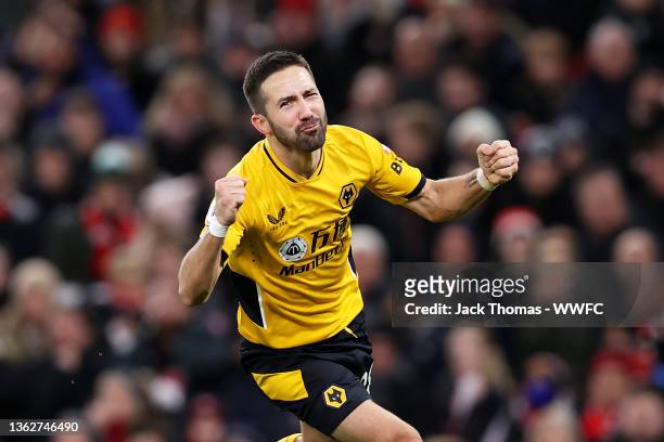 Joao Moutinho of Wolverhampton Wanderers celebrates after scoring his team's first goal during the Premier League match between Manchester United and...