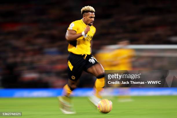 Adama Traore of Wolverhampton Wanderers runs with the ball during the Premier League match between Manchester United and Wolverhampton Wanderers at...