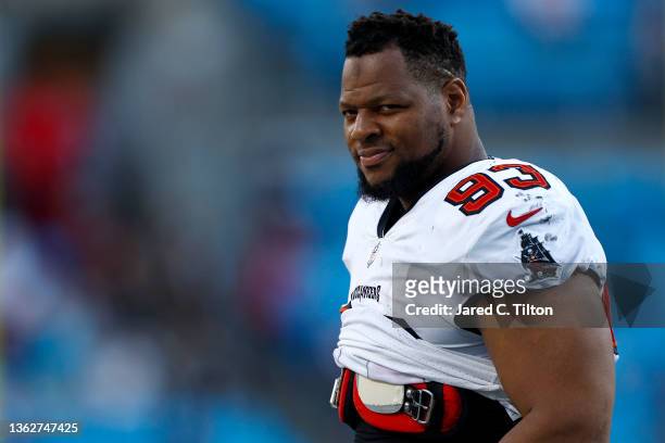 Ndamukong Suh of the Tampa Bay Buccaneers looks on during the second half of the game against the Carolina Panthers at Bank of America Stadium on...