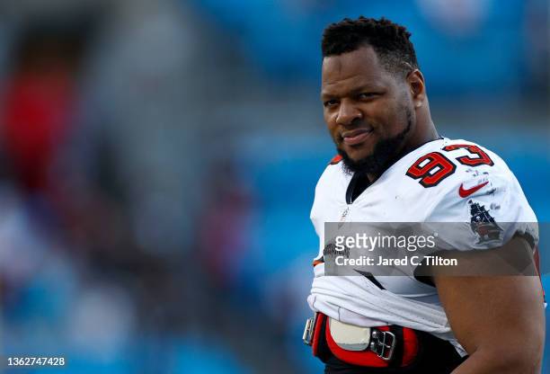 Ndamukong Suh of the Tampa Bay Buccaneers looks on during the second half of the game against the Carolina Panthers at Bank of America Stadium on...