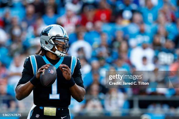 Cam Newton of the Carolina Panthers looks to pass during the second half of the game against the Tampa Bay Buccaneers at Bank of America Stadium on...