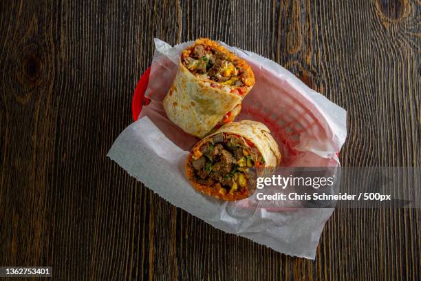 mexican food,high angle view of food on table,massachusetts,united states,usa - burrito stock pictures, royalty-free photos & images