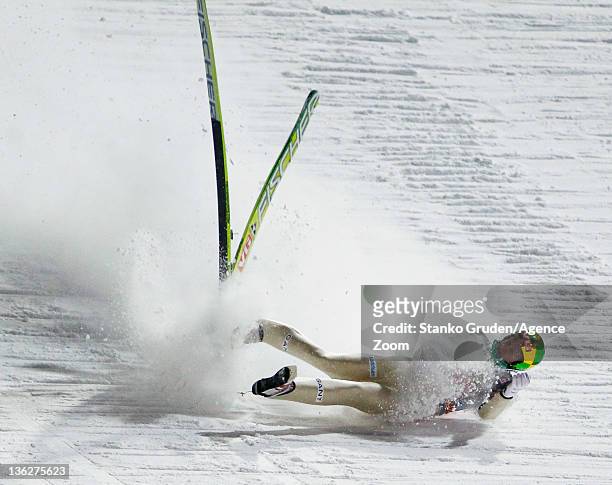Tom Hilde of Norway crashes during the FIS Ski Jumping World Cup Vierschanzentournee on December 30, 2011 in Oberstdorf, Germany.