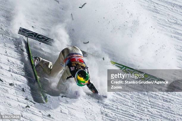 Tom Hilde of Norway crashes during the FIS Ski Jumping World Cup Vierschanzentournee on December 30, 2011 in Oberstdorf, Germany.