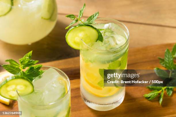 homemade cucumber mint lemonade,close-up of drink on table - cucumber cocktail stock pictures, royalty-free photos & images