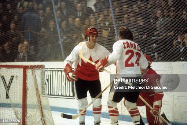 Paul Henderson and Bobby Clarke celebrate Henderson's game winning goal behind the net during Game 7 of the 1972 Summit Series against the Soviet...