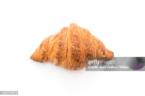 butter croissant on white,close-up of croissant against white background - croissant white background stockfoto's en -beelden