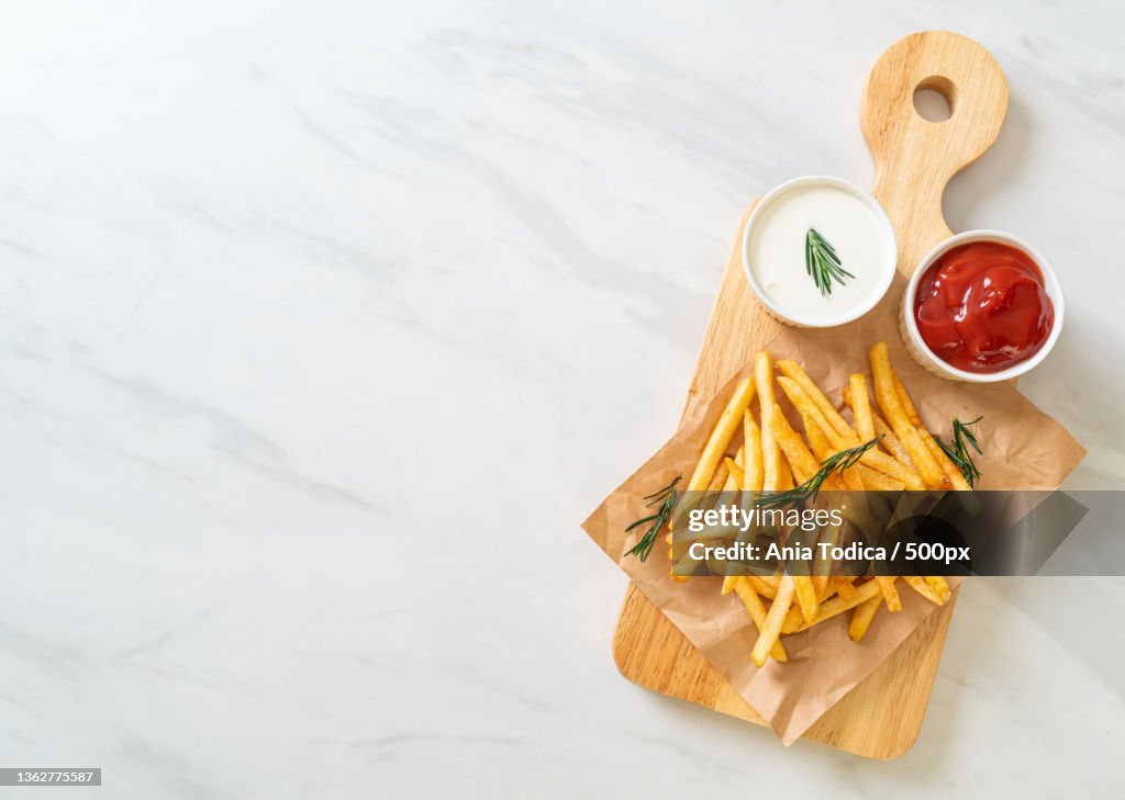 French fries with sour cream and ketchup