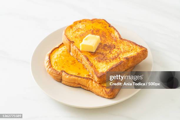 french toasted with butter and honey - bread butter stock pictures, royalty-free photos & images