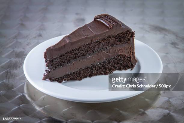 italian food,close-up of chocolate cake in plate on table - sachertorte stock pictures, royalty-free photos & images