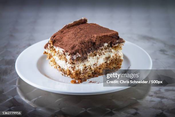 italian food,close-up of cake in plate on table - tiramisu stock pictures, royalty-free photos & images