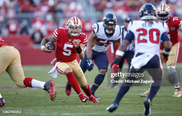 Trey Lance of the San Francisco 49ers rushes during the game against the Houston Texans at Levi's Stadium on January 2, 2022 in Santa Clara,...