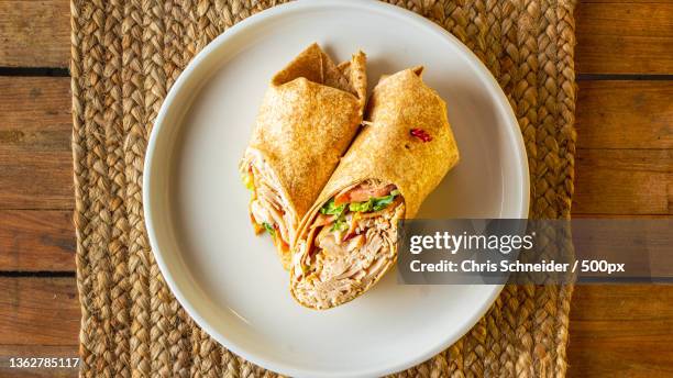 american food,directly above shot of bread in plate on burlap,rhode island,united states,usa - wrap sandwich stock-fotos und bilder