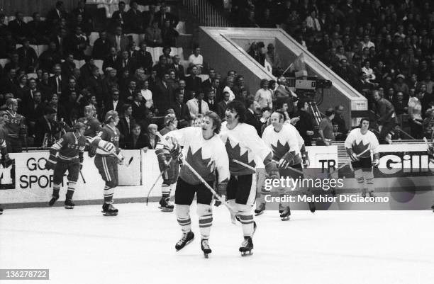 Bobby Clarke and Guy Lapointe of Canada celebrate on the ice after their game with the Soviet Union in the 1972 Summit Series at the Luzhniki Ice...
