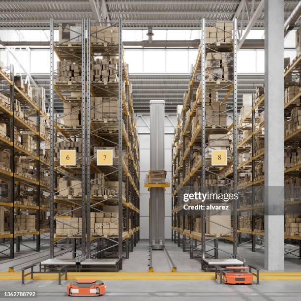 interior of a futuristic warehouse with automated guided vehicles in 3d render - automatic stock pictures, royalty-free photos & images
