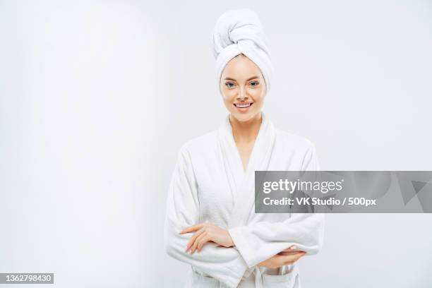 woman has soft healthy skin after taking shower,wears bath robe - bath isolated stock pictures, royalty-free photos & images