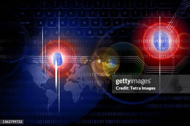 computer cyber attack with thumbprints and keyboard on world map - terrorbekämpfung stock-fotos und bilder