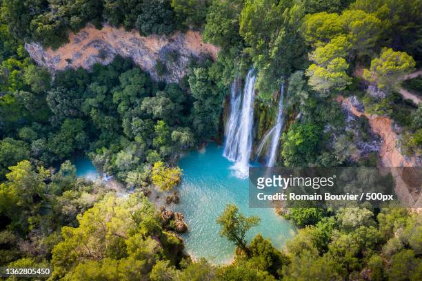 fly over sillans,high angle view of waterfall in forest,france - cascade france stock-fotos und bilder
