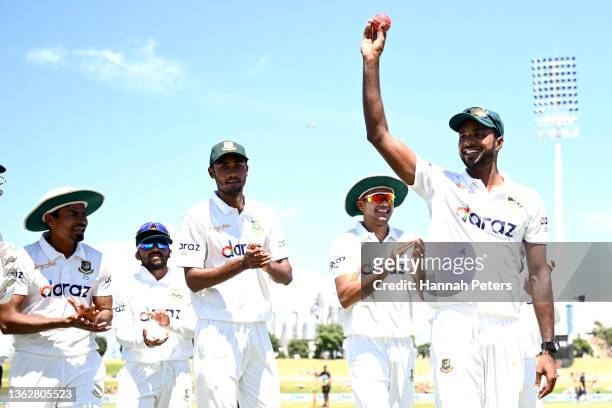 Ebadot Hossain of Bangladesh is clapped off the field after claiming six wickets during day five of the First Test Match in the series between New...