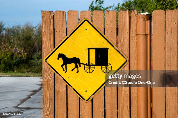 buggy warning sign - amish indiana stock pictures, royalty-free photos & images