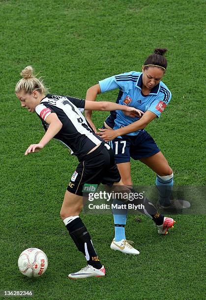 Kyah Simon of Sydney FC competes with Alanna Kennedy of the Jets during the round 10 W-League match between Sydney FC and the Newcastle Jets at...