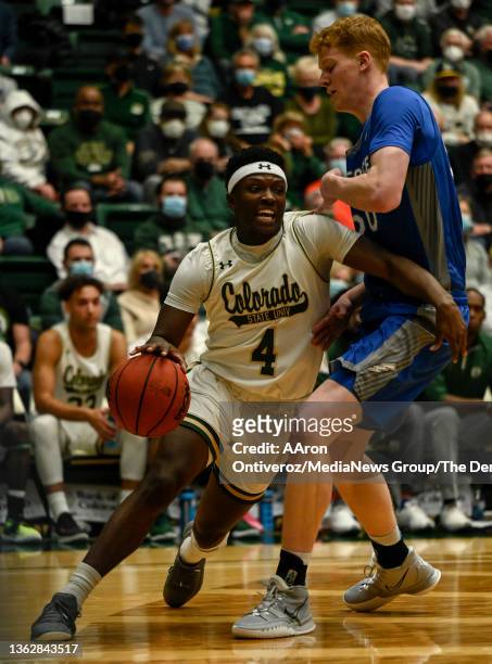 Isaiah Stevens of the Colorado State Rams drives on Ryan Corner of the Air Force Falcons during the second half of CSU"u2019s 67-59 win at at Moby...