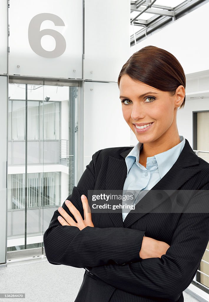 Young businesswoman standing in the office