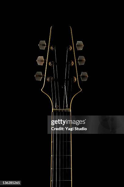 close-up of the electric guitar - musical instrument string stock pictures, royalty-free photos & images