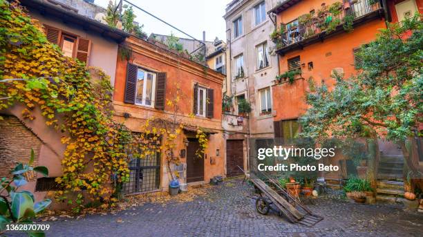 a glimpse of a beautiful and hidden little square in the campo de fiori district in the historic heart of rome - campo de fiori stock pictures, royalty-free photos & images